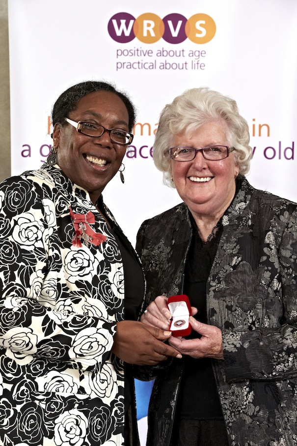 Margaret Veal receives her Diamond Champion pin